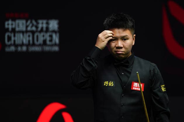 TAIYUAN, CHINA - AUGUST 12: Zhou Yuelong of China reacts in the second round match against Liu Hongyu of China on day 5 of the 2026 World Snooker Tour China Open at Taiyuan Binhe Sports Center on August 12, 2026 in Taiyuan, Shanxi Province of China.  Copyright: xTaixChengzhex 111659519968