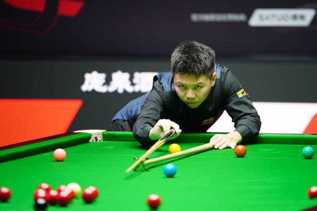 TAIYUAN, CHINA - AUGUST 12: Zhou Yuelong of China plays a shot in the second round match against Liu Hongyu of China on day 5 of the 2026 World Snooker Tour China Open at Taiyuan Binhe Sports Center on August 12, 2026 in Taiyuan, Shanxi Province of China.  Copyright: xTaixChengzhex 111659519956