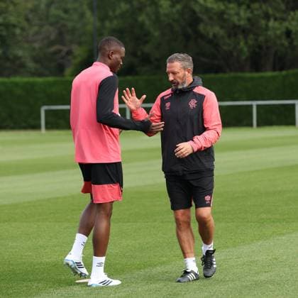 Rangers manager Derek McInnes shakes hands with Olwethu Makhanya at training ahead of tomorrow s Europa League qualifying match against Jagiellonia Bialystok. Rangers Training - The Rangers Training Centre, Glasgow, Lanarkshire, Scotland, UK - 12 Aug 2026Glasgow The Rangers Training Centre Lanarkshire United Kingdom  Copyright: xO Rourke RangersxFC Shutterstockx 17066919e