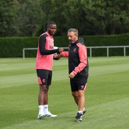 Rangers manager Derek McInnes shakes hands with Olwethu Makhanya at training ahead of tomorrow s Europa League qualifying match against Jagiellonia Bialystok. Rangers Training - The Rangers Training Centre, Glasgow, Lanarkshire, Scotland, UK - 12 Aug 2026Glasgow The Rangers Training Centre Lanarkshire United Kingdom  Copyright: xO Rourke RangersxFC Shutterstockx 17066919l