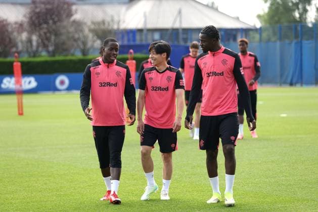 Djeidi Gassama, Daisuke Yokota and Clinton Nsiala walk out for training ahead of tomorrow s Europa League qualifying match against Jagiellonia Bialystok. Rangers Training - The Rangers Training Centre, Glasgow, Lanarkshire, Scotland, UK - 12 Aug 2026Glasgow The Rangers Training Centre Lanarkshire United Kingdom  Copyright: xO Rourke RangersxFC Shutterstockx 17066919cg
