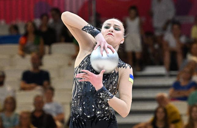 12.08.2026, xhbx, Rhythmische Sportgymnastik Weltmeisterschaft 2026, v.l. Polina Karika (Ukraine) Ball (DFL DFB REGULATIONS PROHIBIT ANY USE OF PHOTOGRAPHS as IMAGE SEQUENCES and or QUASI-VIDEO) Frankfurt am Main *** August 12, 2026, xhbx, 2026 Rhythmic Gymnastics World Championships, from left: Polina Karika, Ukraine, Ball. DFL and DFB regulations prohibit any use of photographs as image sequences and or quasi-video. Frankfurt am Main