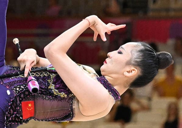 12.08.2026, xhbx, Rhythmische Sportgymnastik Weltmeisterschaft 2026, v.l. Zilu Wang (China) mit Keulen (DFL DFB REGULATIONS PROHIBIT ANY USE OF PHOTOGRAPHS as IMAGE SEQUENCES and or QUASI-VIDEO) Frankfurt am Main *** August 12, 2026, xhbx, 2026 Rhythmic Gymnastics World Championships, from left: Zilu Wang of China with clubs. DFL and DFB regulations prohibit any use of photographs as image sequences and or quasi-video. Frankfurt am Main