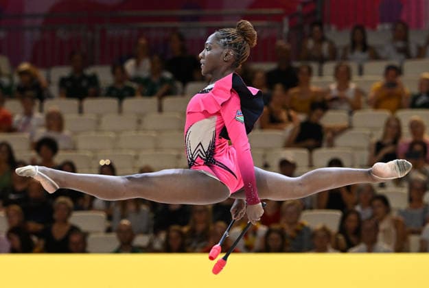 12.08.2026, xhbx, Rhythmische Sportgymnastik Weltmeisterschaft 2026, v.l. Emilia Ekandjo (Namibia) mit Keulen (DFL DFB REGULATIONS PROHIBIT ANY USE OF PHOTOGRAPHS as IMAGE SEQUENCES and or QUASI-VIDEO) Frankfurt am Main *** August 12, 2026, xhbx, 2026 Rhythmic Gymnastics World Championships, from left: Emilia Ekandjo of Namibia with clubs. DFL DFB REGULATIONS PROHIBIT ANY USE OF PHOTOGRAPHS as IMAGE SEQUENCES and or QUASI-VIDEO. Frankfurt am Main