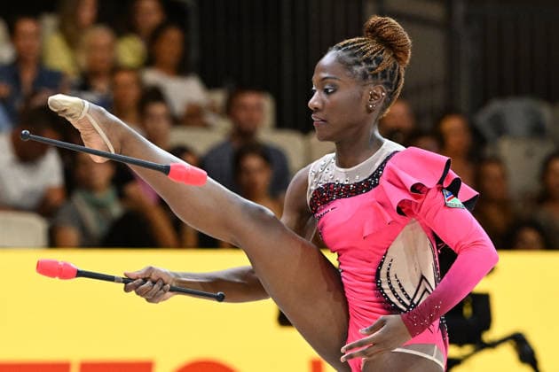 12.08.2026, xhbx, Rhythmische Sportgymnastik Weltmeisterschaft 2026, v.l. Emilia Ekandjo (Namibia) mit Keulen (DFL DFB REGULATIONS PROHIBIT ANY USE OF PHOTOGRAPHS as IMAGE SEQUENCES and or QUASI-VIDEO) Frankfurt am Main *** August 12, 2026, xhbx, 2026 Rhythmic Gymnastics World Championships, from left: Emilia Ekandjo of Namibia with clubs. DFL DFB REGULATIONS PROHIBIT ANY USE OF PHOTOGRAPHS as IMAGE SEQUENCES and or QUASI-VIDEO. Frankfurt am Main