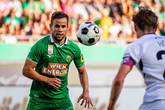 SOCCER - UEFA ECL, Rapid vs Paide VIENNA,AUSTRIA,12.AUG.26 - SOCCER - UEFA Conference League, qualification, SK Rapid Wien vs Paide Linnameeskond. Image shows Louis Schaub (Rapid) and Oskar Hoim (Paide).  GEPAxpictures xKevinxHackner