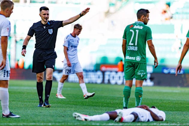 VIENNA, AUSTRIA - 12 AUGUST 2026: Image shows Referee Shurman Denys (Ukraine) and Sohna Modou (Paide, 11) during UEFA Conference League 2026 27 Third Qualifying Round, Second Leg: SK Rapid Wien vs Paide Linnameeskond at Weststadion on 12 08 2026 in Vienna, Austria. Austria Copyright: xFröhlichxPascalx