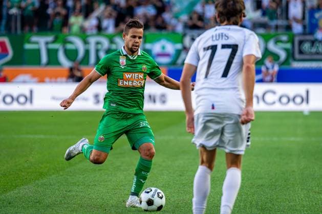 SOCCER - UEFA ECL, Rapid vs Paide VIENNA,AUSTRIA,12.AUG.26 - SOCCER - UEFA Conference League, qualification, SK Rapid Wien vs Paide Linnameeskond. Image shows Louis Schaub (Rapid) and Daniel Luts (Paide).  GEPAxpictures xKevinxHackner