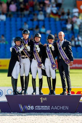 AACHEN - FEI World Championships 2026, AACHEN - FEI World Championships 2026 Team Germany HEMMER Katharina (GER), NETZ Raphael (GER), WANDRES Frederic (GER), WERTH Isabell (GER), ROESER Klaus (Chef dÂ Equipe) Medal ceremony Team FEI Dressage World Championship, WM, Weltmeisterschaft Grand Prix de Dressage Team Finale & Einzelqualifikation Lambertz-Preis Aachen, Reitstadion Soers 12. August 2026 - *** AACHEN FEI World Championships 2026, AACHEN FEI World Championships 2026 Team Germany: Katharina Hemmer (GER), Raphael Netz (GER), Frederic Wandres (GER), Isabell Werth (GER), Klaus Roeser, Chef d’Equipe; Medal ceremony; Team FEI Dressage World Championship; Grand Prix de Dressage; Team Final; Individual Qualifying Round; Lambertz Prize Aachen; Soers Equestrian Stadium; August 12, 2026