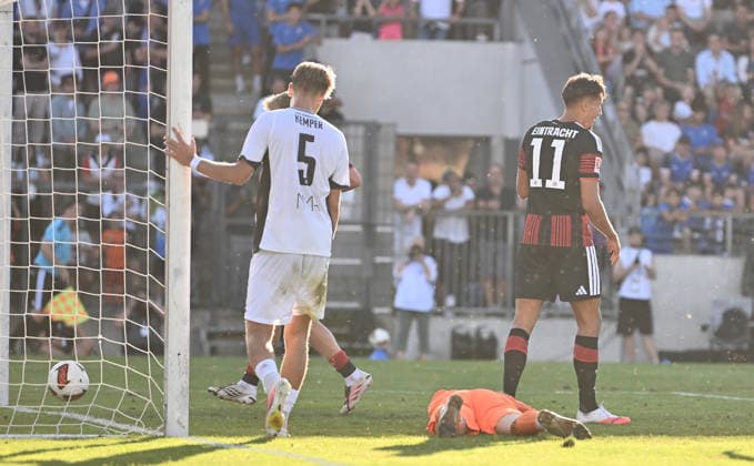12.08.2026, xfux, Fussball Testspiel, FSV Frankfurt - Eintracht Frankfurt, v.l. Lucas Becker (FSV Frankfurt), Younes Ebnoutalib (Eintracht Frankfurt) Goal scored, Tor zum 0:2 (DFL DFB REGULATIONS PROHIBIT ANY USE OF PHOTOGRAPHS as IMAGE SEQUENCES and or QUASI-VIDEO) Frankfurt am Main *** August 12, 2026, xfux, Soccer Friendly Match, FSV Frankfurt vs. Eintracht Frankfurt, from left: Lucas Becker (FSV Frankfurt), Younes Ebnoutalib (Eintracht Frankfurt) – Goal scored, Goal making it 0–2. DFL and DFB regulations prohibit any use of photographs as image sequences and or quasi-video. Frankfurt am Main