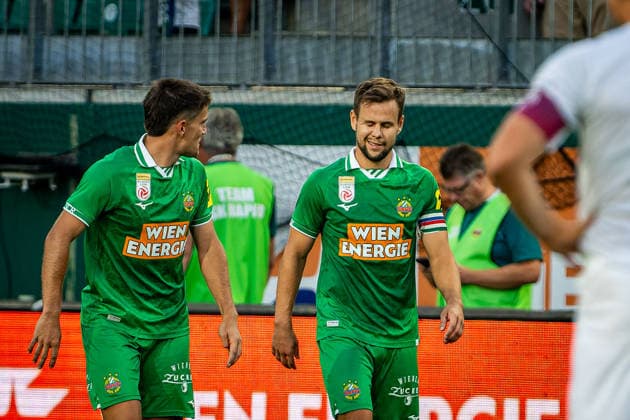 SOCCER - UEFA ECL, Rapid vs Paide VIENNA,AUSTRIA,12.AUG.26 - SOCCER - UEFA Conference League, qualification, SK Rapid Wien vs Paide Linnameeskond. Image shows the rejoicing of Jonas Auer and Louis Schaub (Rapid).  GEPAxpictures xKevinxHackner