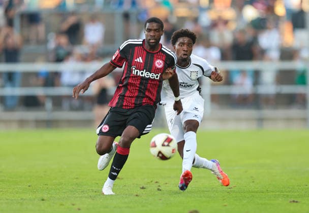 12.08.2026, Fussball Testspiel, FSV Frankfurt - Eintracht Frankfurt, v.l., Niels Nkounkou (Eintracht Frankfurt), Uche Obiogumu (FSV Frankfurt) DFL DFB REGULATIONS PROHIBIT ANY USE OF PHOTOGRAPHS AS IMAGE SEQUENCES AND OR QUASI-VIDEO. xdcx *** August 12, 2026, Soccer friendly match, FSV Frankfurt vs. Eintracht Frankfurt, from left: Niels Nkounkou (Eintracht Frankfurt), Uche Obiogumu (FSV Frankfurt). DFL and DFB regulations prohibit any use of photographs as image sequences and or quasi-video. xdcx Copyright: HMBxMedia Claus