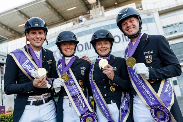 AACHEN - FEI World Championships 2026, AACHEN - FEI World Championships 2026 Team Germany HEMMER Katharina (GER), NETZ Raphael (GER), WANDRES Frederic (GER), WERTH Isabell (GER), ROESER Klaus (Chef dÂ Equipe) Medal ceremony Team FEI Dressage World Championship, WM, Weltmeisterschaft Grand Prix de Dressage Team Finale & Einzelqualifikation Lambertz-Preis Aachen, Reitstadion Soers 12. August 2026 - *** AACHEN FEI World Championships 2026, AACHEN FEI World Championships 2026 Team Germany: Katharina Hemmer (GER), Raphael Netz (GER), Frederic Wandres (GER), Isabell Werth (GER), Klaus Roeser, Chef d’Equipe; Medal Ceremony; FEI Dressage World Championship Team Grand Prix; Team Final; Individual Qualification; Lambertz Prize Aachen; Soers Equestrian Stadium; August 12, 2026