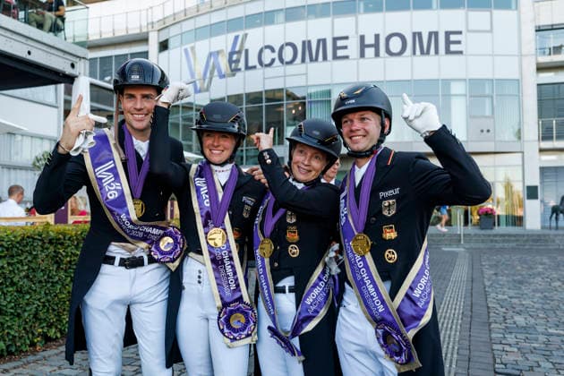 AACHEN - FEI World Championships 2026, AACHEN - FEI World Championships 2026 Team Germany HEMMER Katharina (GER), NETZ Raphael (GER), WANDRES Frederic (GER), WERTH Isabell (GER), ROESER Klaus (Chef dÂ Equipe) Medal ceremony Team FEI Dressage World Championship, WM, Weltmeisterschaft Grand Prix de Dressage Team Finale & Einzelqualifikation Lambertz-Preis Aachen, Reitstadion Soers 12. August 2026 - *** AACHEN FEI World Championships 2026, AACHEN FEI World Championships 2026 Team Germany: Katharina Hemmer (GER), Raphael Netz (GER), Frederic Wandres (GER), Isabell Werth (GER), Klaus Roeser, Chef d’Equipe; Medal Ceremony; FEI Dressage World Championship Team Grand Prix; Team Final; Individual Qualification; Lambertz Prize Aachen; Soers Equestrian Stadium; August 12, 2026