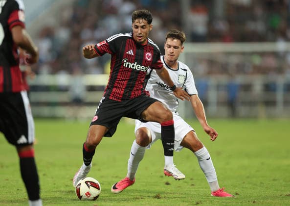 12.08.2026, Fussball Testspiel, FSV Frankfurt - Eintracht Frankfurt, v.l., Fares Chaibi (Eintracht Frankfurt), Leandro Simunic (FSV Frankfurt) DFL DFB REGULATIONS PROHIBIT ANY USE OF PHOTOGRAPHS AS IMAGE SEQUENCES AND OR QUASI-VIDEO. xdcx *** August 12, 2026, Soccer friendly match, FSV Frankfurt vs. Eintracht Frankfurt, from left: Fares Chaibi (Eintracht Frankfurt), Leandro Simunic (FSV Frankfurt). DFL and DFB regulations prohibit any use of photographs as image sequences and or quasi-video. xdcx Copyright: HMBxMedia Claus