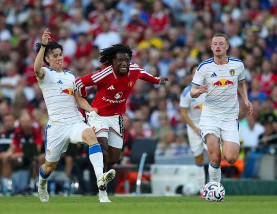 Football - 2026 2027 pre-season friendly - Manchester United, ManU vs. Leeds United - Croke Park, Dublin - Wednesday 12th August 2026 Manchester United s Patrick Dorgu in action against Leeds United s Ao Tanaka 