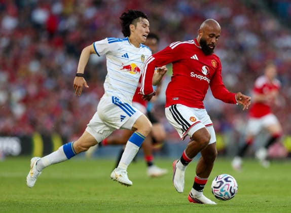 Football - 2026 2027 pre-season friendly - Manchester United, ManU vs. Leeds United - Croke Park, Dublin - Wednesday 12th August 2026 Manchester United s Bryan Mbeumo and Leeds United s Ao Tanaka 