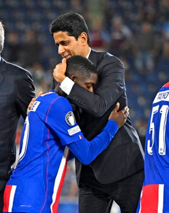 12.08.2026, Fussball UEFA-Supercup 2026: Finale in Salzburg (Österreich), Paris St. Germain - Aston Villa, in der Red Bull Arena (Wals bei Salzburg). Präsident Nasser Al-Khelaifi (Paris St. Germain) herzt Ousmane Dembele (FC Paris Saint-Germain) ***DFL and DFB regulations prohibit any use of photographs as image sequences and or quasi-video.*** *** August 12, 2026, Soccer: 2026 UEFA Super Cup Final in Salzburg, Austria, Paris Saint-Germain vs. Aston Villa, at the Red Bull Arena in Wals near Salzburg; President Nasser Al Khelaifi of Paris Saint-Germain hugs Ousmane Dembélé of Paris Saint-Germain FC ***DFL and DFB regulations prohibit any use of photographs as image sequences and or quasi-video***