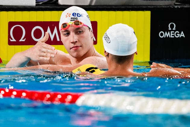 David Popovici of Romania, Gold, Egor Kornev of Neutral Athletes B, Silver celebrates after the Men™s 100m Freestyle Final during the European Aquatics Championships at the Olympic Aquatic Center in Paris (France), August 12, 2026. Andrea Staccioli