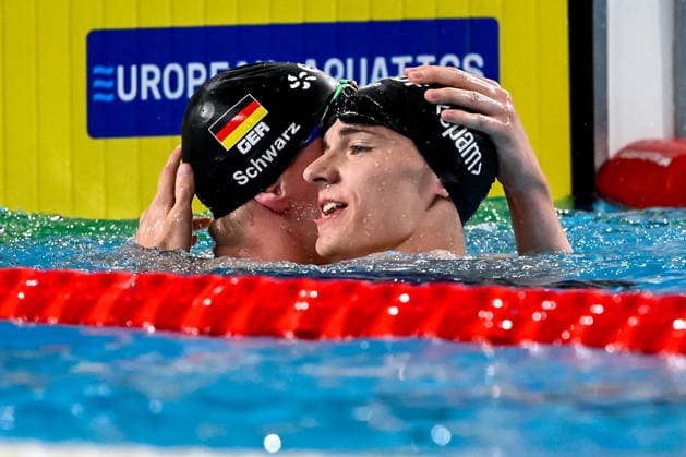 Sven Schwarz of Germany, silver, Johannes Liebmann of Germany, gold celebrate after the swimming 800m Freestyle Men Final during the European Aquatics Championships at the Olympic Aquatic Center in Paris (France), August 12, 2026. Andrea Staccioli
