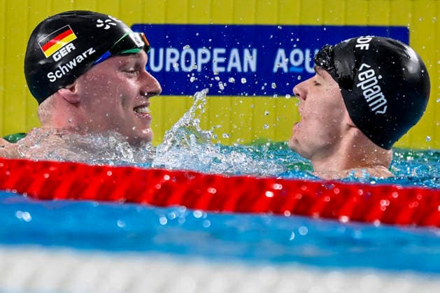 Johannes Liebmann of Germany and Sven Schwarz of Germany celebrate after winning the gold and silver medal in the swimming Men s 800m Freestyle final during the European Aquatics Championships at the Olympic Aquatic Center in Paris (France), August 12, 2026.