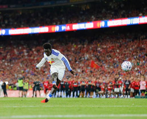 RECORD DATE NOT STATED 12th August 2026; Croke Park, Dublin, Ireland; Friendly Football, Manchester United, ManU versus Leeds United; Wilfried Gnonto of Leeds United takes a shot during the penalty shootout PeterxFitzpatrick