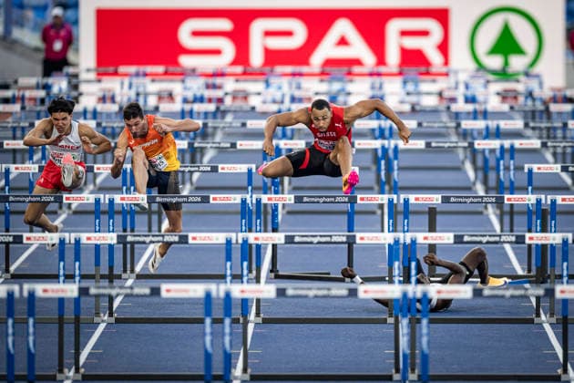 RECORD DATE NOT STATED 12th August 2026; Alexander Stadium, Birmingham, Midlands, England; 2026 European Athletics Championships, Day Three; Jason Joseph (SUI) on his way to winning his heat of the mens 110m hurdles as Elie Bacari (BEL) falls GodfreyxPitt