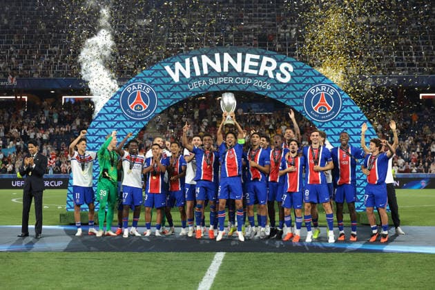 Paris Saint Germain v Aston Villa - UEFA Super Cup - Stadio Salzburg Salzburg, Austria, 12th August 2026. Paris Saint-Germain players; Marquinhos, Achraf Hakimi, Lucas Beraldo, Illia Zabarnyi, Khvicha Kvaratskhelia, Fabian Ruiz, Ousmane Dembele, Maghnes Akliouche, Lucas Digne, Desire Doue, Vitinha, Lucas Hernandez, Senny Mayulu, Nuno Mendes, Dro Fernandez, Bradley Barcola, Warren Zaire-Emery, Quentin Ndjantou Mbitcha, Ibrahim Mbaye, Willian Pacho and Joao Neves and Head Coach Luis Enrique and Nasser Al-Khelaifi President of PSG celebrate with the trophy following the 2-1 victory in the Paris Saint Germain vs Aston Villa UEFA Super Cup match at Stadion Salzburg, Salzburg. Picture credit should read: Jonathan Moscrop Salzburg Stadion Salzburg Austria