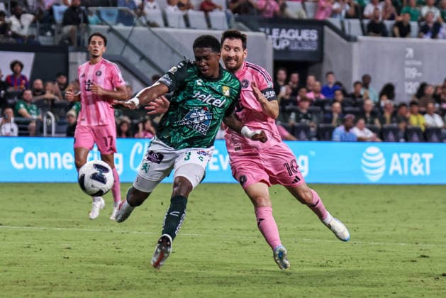 MIAMI, FL - AUGUST 12: Leo Messi 10 of Inter Miami CF and Juan Guevara 3 of Leon battle for a ball during a Leagues Cup soccer match between Inter Miami CF and Leon at NU Stadium on August 12, 2026 in Miami, Florida.(Photo by Chris Arjoon Icon Sportswire) SOCCER: AUG 12 Leagues Cup Miami vs Monterrey EDITORIAL USE ONLY Icon26081200000029