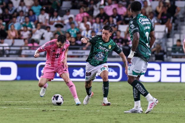 MIAMI, FL - AUGUST 12: Leo Messi 10 of Inter Miami CF and Rodrigo Echeverria 20 of Leon battle for a ball during a Leagues Cup soccer match between Inter Miami CF and Leon at NU Stadium on August 12, 2026 in Miami, Florida.(Photo by Chris Arjoon Icon Sportswire) SOCCER: AUG 12 Leagues Cup Miami vs Monterrey EDITORIAL USE ONLY Icon26081200000043