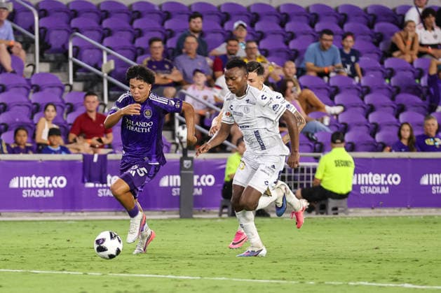 August 12, 2026, Orlando, Florida, USA: Orlando City SC midfielder GUSTAVO CARABALLO (65) battles for the ball during a match against Atlo tico San Luis. Orlando City SC hosted Athletico San Luis in a Leagues Cup match at Inter.Co Stadium in Orlando, FL. Orlando USA - ZUMAm299 20260812_znp_m299_002 Copyright: xTaylorxMcFeex