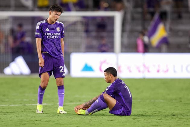 August 12, 2026, Orlando, Florida, USA: Orlando City SC forward JUSTIN ELLIS (22) & midfielder TIAGO SOUZA (11) on the field after a a late goal by Atlo tico San Luis to tie the game. Orlando City SC hosted Athletico San Luis in a Leagues Cup match at Inter.Co Stadium in Orlando, FL. Orlando USA - ZUMAm299 20260812_znp_m299_004 Copyright: xTaylorxMcFeex