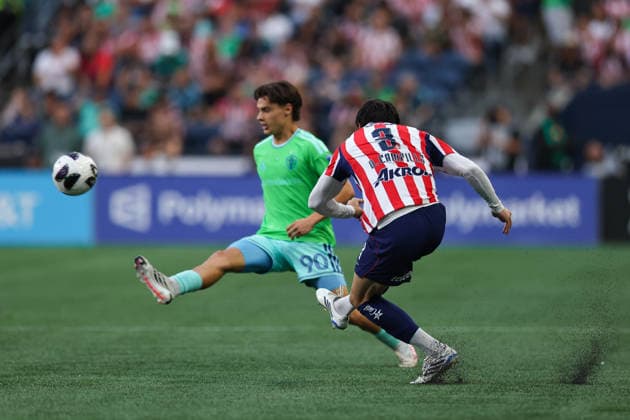 SEATTLE, WA - AUGUST 12: Defender Diego Campillo 3 of Chivas de Guadalajara kicks the ball past midfielder Sebastian Gomez 90 of the Seattle Sounders during the Leagues Cup match between Chivas de Guadalajara and the Seattle Sounders on August 12, 2026 at Lumen Field in Seattle, Washington. (Photo by Henry Rodenburg Icon Sportswire) SOCCER: AUG 12 Leagues Cup Seattle vs Chivas de Guadalajara EDITORIAL USE ONLY Icon26081204