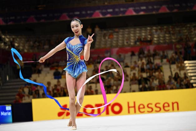 OTHER - Gymnastics - 42nd Rhythmic gymnastics, Rhythmische Sportgymnastik, RSG World Championships Photo by IPA ABACAPRESS.COM87441456 - WANG Qi (CHN) performing her ribbon routine during the 42nd Rhythmic Gymnastics World Championships in Frankfurt am Main, Germany, on August 13, 2026 Frankfurt am Main Germany  Copyright: xIPAxSport ABACAx