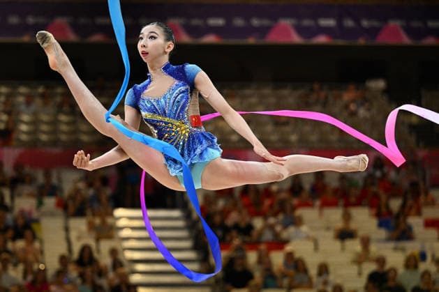 OTHER - Gymnastics - 42nd Rhythmic gymnastics, Rhythmische Sportgymnastik, RSG World Championships Photo by IPA ABACAPRESS.COM87441443 - WANG Qi (CHN) performing her ribbon routine during the 42nd Rhythmic Gymnastics World Championships in Frankfurt am Main, Germany, on August 13, 2026 Frankfurt am Main Germany  Copyright: xIPAxSport ABACAx