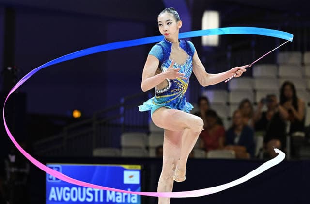 13.08.2026, xhbx, Rhythmische Sportgymnastik Weltmeisterschaft 2026, v.l. Qi Wang (China) Band (DFL DFB REGULATIONS PROHIBIT ANY USE OF PHOTOGRAPHS as IMAGE SEQUENCES and or QUASI-VIDEO) Frankfurt am Main *** August 13, 2026, xhbx, 2026 Rhythmic Gymnastics World Championships, from left: Qi Wang (China), ribbon; DFL, DFB. REGULATIONS PROHIBIT ANY USE OF PHOTOGRAPHS AS IMAGE SEQUENCES AND OR QUASI-VIDEO. Frankfurt am Main