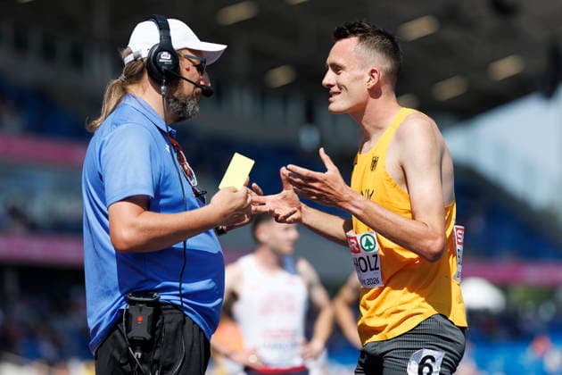BIRMINGHAM, GREAT BRITAIN - AUGUST 13, 2026: Niklas BUCHHOLZ (GER Germany) discusses with a referee about a yellow card after the 3000m steeplechase qualification during the European Athletics Championships at Alexander Stadium on August 13, 2026 in Birmingham, Great Britain. Great Britain Copyright: xAxelxKohringx
