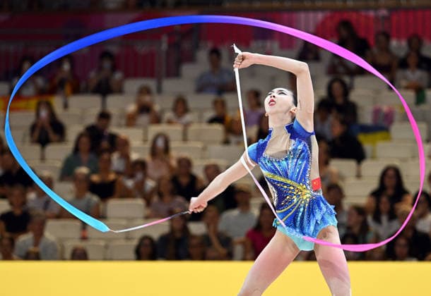 13.08.2026, xhbx, Rhythmische Sportgymnastik Weltmeisterschaft 2026, v.l. Qi Wang (China) Band (DFL DFB REGULATIONS PROHIBIT ANY USE OF PHOTOGRAPHS as IMAGE SEQUENCES and or QUASI-VIDEO) Frankfurt am Main *** August 13, 2026, xhbx, 2026 Rhythmic Gymnastics World Championships, from left: Qi Wang (China), ribbon; DFL, DFB. REGULATIONS PROHIBIT ANY USE OF PHOTOGRAPHS AS IMAGE SEQUENCES AND OR QUASI-VIDEO. Frankfurt am Main