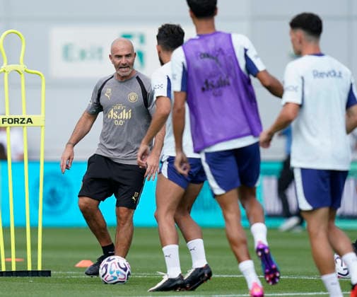 Manchester, England, Enzo Maresca coach of Manchester City during a training session at the Joie Stadium, Manchester. Picture date: 13th August 2026. Picture credit should read: Andrew Yates Sportimage EDITORIAL USE ONLY. No use with unauthorised audio, video, data, fixture lists, club league logos or live services. Online in-match use limited to 120 images, no video emulation. No use in betting, games or single club league player publications. SPI_024_Man_City_Training SPI-4902-0027