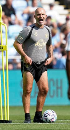 Manchester, England, 13th August 2026. Enzo Maresca coach of Manchester City looks on during a training session at the Joie Stadium, Manchester. Picture date: 13th August 2026. Picture credit should read: Andrew Yates Sportimage EDITORIAL USE ONLY. No use with unauthorised audio, video, data, fixture lists, club league logos or live services. Online in-match use limited to 120 images, no video emulation. No use in betting, games or single club league player publications. SPI_033_Man_City_Training SPI-4902-0034