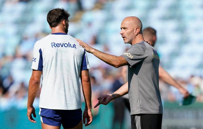 Manchester, England, 13th August 2026. Ruben Dias of Manchester City is spoken to by Enzo Maresca coach of Manchester City during a training session at the Joie Stadium, Manchester. Picture date: 13th August 2026. Picture credit should read: Andrew Yates Sportimage EDITORIAL USE ONLY. No use with unauthorised audio, video, data, fixture lists, club league logos or live services. Online in-match use limited to 120 images, no video emulation. No use in betting, games or single club league player publications. SPI_058_Man_City_Training SPI-4902-0061