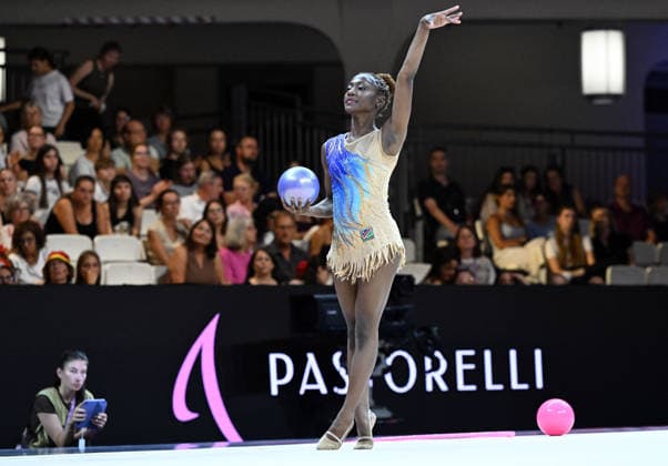 13.08.2026, xhbx, Rhythmische Sportgymnastik Weltmeisterschaft 2026, v.l. Emilia Ekandjo (Namibia) Ball (DFL DFB REGULATIONS PROHIBIT ANY USE OF PHOTOGRAPHS as IMAGE SEQUENCES and or QUASI-VIDEO) Frankfurt am Main *** August 13, 2026, xhbx, 2026 Rhythmic Gymnastics World Championships, from left: Emilia Ekandjo, Namibia, Ball, DFL, DFB. REGULATIONS PROHIBIT ANY USE OF PHOTOGRAPHS AS IMAGE SEQUENCES AND OR QUASI-VIDEO. Frankfurt am Main