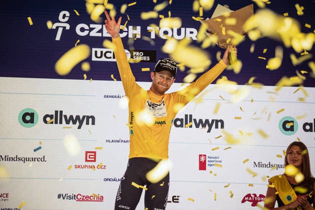Czech Tour 2026, stage 1, Road cycling, Rad, Radsport, Strasse Riley Sheehan (NSN Cycling Team) on podium in yellow jersey, on August 13, 2026, Karlovy Vary, Czechia. (CTKxPhoto JanxBrychta) CTKPhotoF202608130030301  CTKPhotoF202608130030301