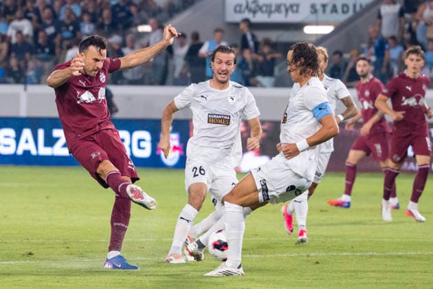 SOCCER - UEFA EL, Pafos vs RBS LIMASSOL,CYPRUS,13.AUG.26 - SOCCER - UEFA Europa League, qualification, Pafos FC vs Red Bull Salzburg. Image shows Haris Tabakovic (RBS) and Ivan Sunjic (Pafos).  GEPAxpictures xXenophonxKarakalo