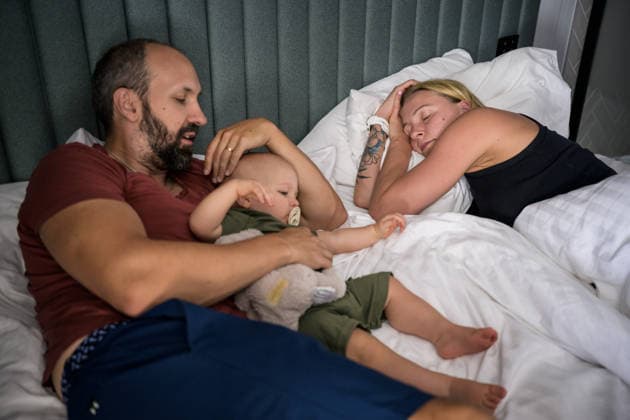 260813 Swedish swimmer Sarah Sjöström takes a nap while her husband Johan de Jong Skierus takes care of their son Adrian in their hotel room during day 14 of the 2026 European Aquatics Championships on August 13, 2026 in Saint-Denis. Sarah Sjöström is back competing at her first championship after giving birth on August 26, 2025, with an eye on competing at the 2028 Olympic Games, Olympische Spiele, Olympia, OS in Los Angeles, which would be her sixth straight appearance at the Games after making her debut in 2008. Photo: Joel Marklund BILDBYRAN kod JM JM0842 bbeng simning swimming svomming 2026 european aquatics championships em *** August 13, 2026: Swedish swimmer Sarah Sjöström takes a nap while her husband, Johan de Jong Skierus, looks after their son Adrian in their hotel room on day 14 of the 2026 European Aquatics Championships on August 13, 2026 in Saint-Denis. Sarah Sjöström is back competing in her first championship since giving birth on August 26, 2025, with her sights set on competing at the 2028 Olympic Games in Los Angeles, which would mark her sixth consecutive appearance at the Games following her debut in 2008. Photo: Joel Marklund, BILDBYRAN. Code: JM JM0842 bbeng swimming 2026 European Aquatics Championships EM  Copyright: JOELxMARKLUND BB260813JM189