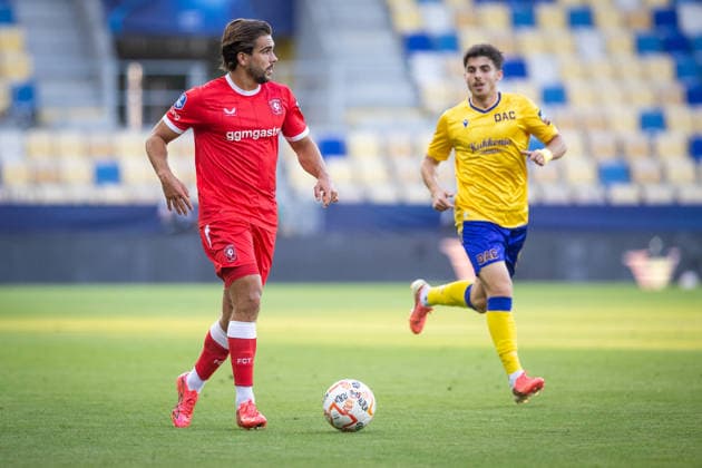 DAC DUNAJSKA STREDA - TWENTE Ammar Ramadan of DAC and Daan Rots of Twente during the second leg of third qualifying round of UEFA Conference league football match between DAC Dunajska Streda and Twente at the DAC Arena MOL Arena. Dunajska Streda, Slovakia, August 13, 2026. Photo by Branislav Racko Copyright: xx 080A7050