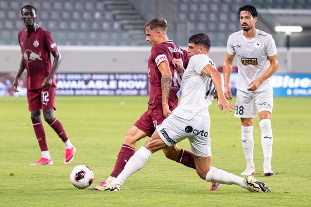 SOCCER - UEFA EL, Pafos vs RBS LIMASSOL,CYPRUS,13.AUG.26 - SOCCER - UEFA Europa League, qualification, Pafos FC vs Red Bull Salzburg. Image shows Nikolas Veratschnig (RBS) and Nikolas Ioannou (Pafos).  GEPAxpictures xXenophonxKarakalos