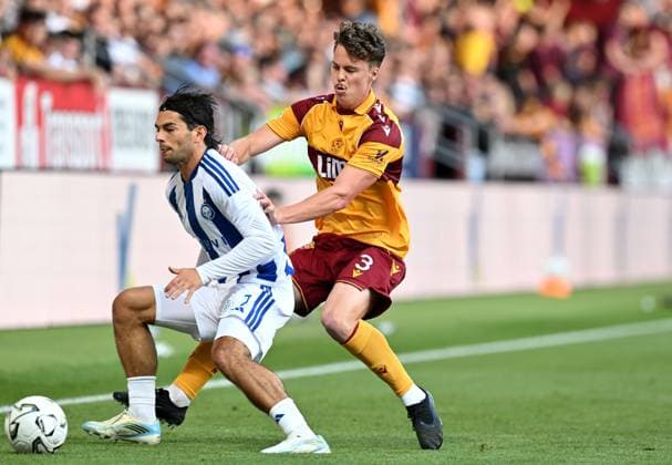 Jake Girdwood-Reich of Motherwell and Pyry Mentu of HJK Helsinki Motherwell v HJK Helsinki, UEFA Conference League, 3rd Qualifying Round, Second Leg, Football, Fir Park, Motherwell, Scotland, UK - 13 Aug 2026Motherwell Fir Park Scotland United Kingdom  Copyright: xMarkxRunnacles Shutterstockx 17069362p