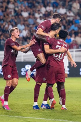 SOCCER - UEFA EL, Pafos vs RBS LIMASSOL,CYPRUS,13.AUG.26 - SOCCER - UEFA Europa League, qualification, Pafos FC vs Red Bull Salzburg. Image shows the rejoicing of Haris Tabakovic (RBS) with his team.  GEPAxpictures xXenophonxKarakalos