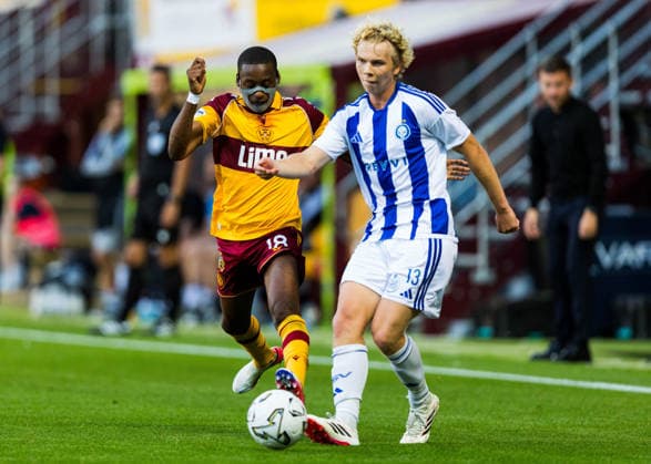 Motherwell v HJK Helsinki, UEFA Conference League Tawanda Maswanhise (18 - Motherwell) battles with Kaius Simojoki (13 - HJK Helsinki) during the UEFA Conference League match between Motherwell and HJK Helsinki at Fir Park, Motherwell, UK on 13 August 2026. Editorial use only , Copyright: xRaymondxDaviesx PSI-24663-0013